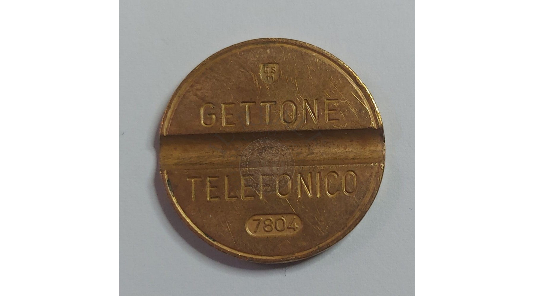 GETTONE TELEFONICO CON SEGNO DI ZECCA NUMERO DI SERIE 7804 RARO